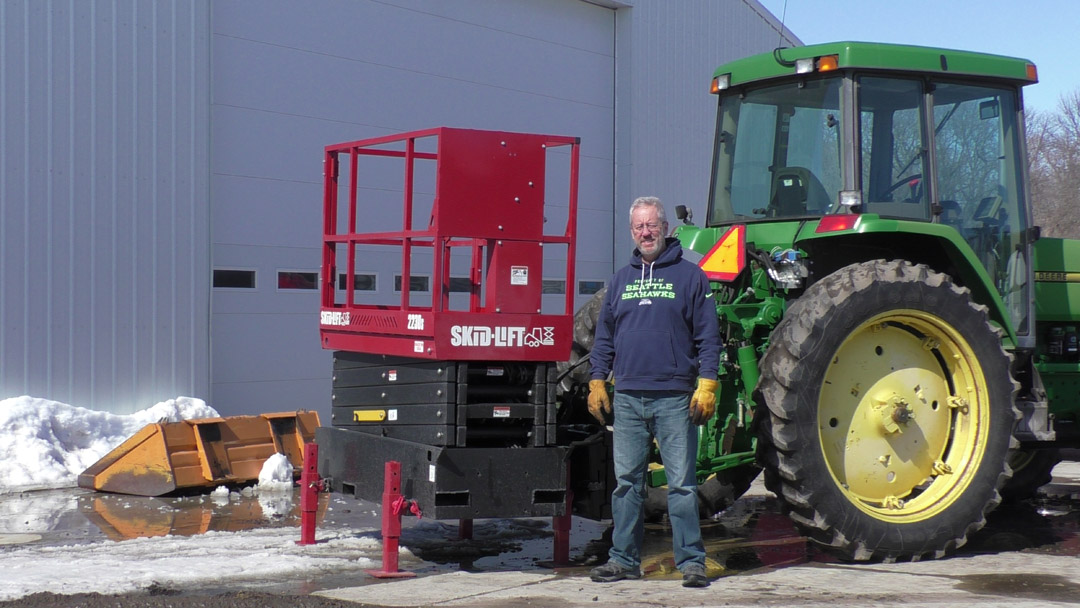 Craig Blair with Skid-Lift on Johne Deere Tractor