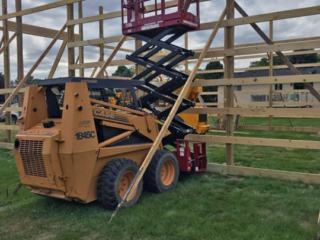 2230S Skid-Lift with Case 1845C Skidsteer on Job Site 2230S Skid-Lift with Case 1845C Skidsteer on Job Site