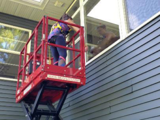 Window Cleaning with Skid-Lift Window Cleaning with Skid-Lift