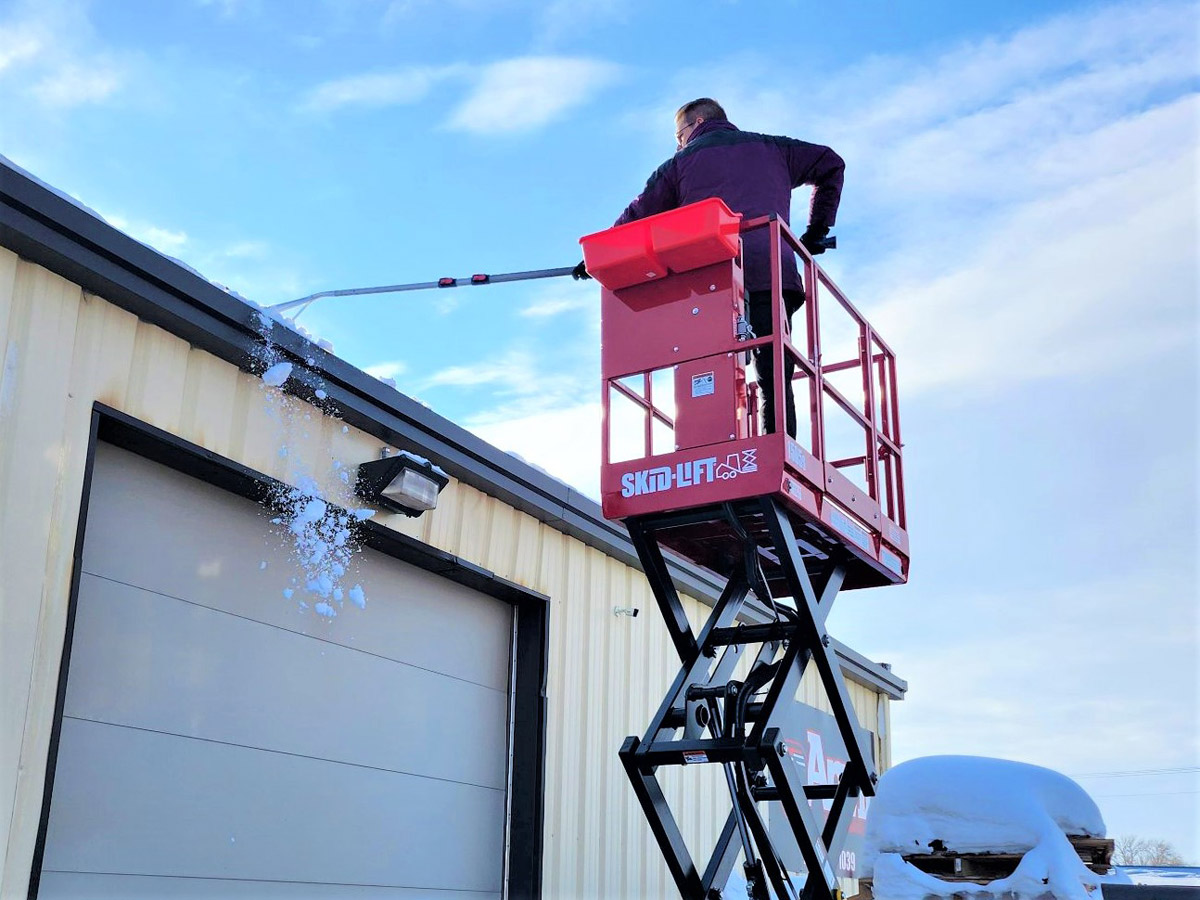 Removing Snow with Roof Rake